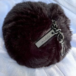 Puffy pom bag